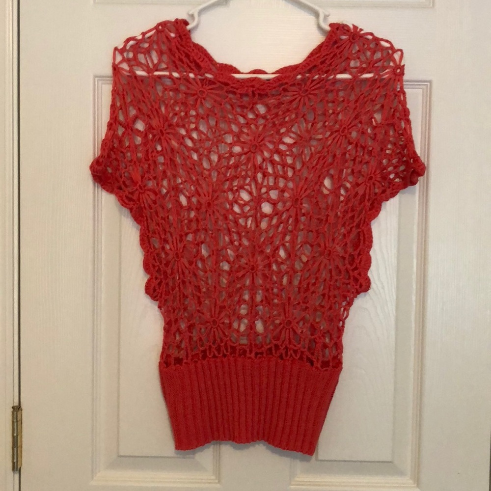 Coral pink sweater top with flower designs